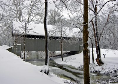 covered bridge during winter