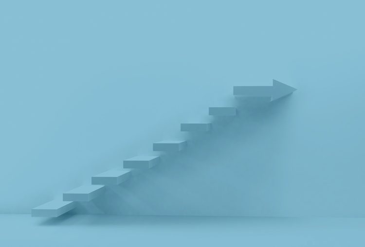blue image of stairs leading upward - continuum of care